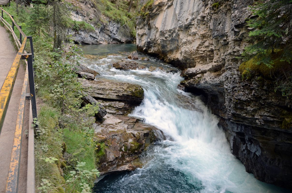 03 A Small Falls On Johnston Creek On Walk Towards Lower Falls In Johnston Canyon In Summer